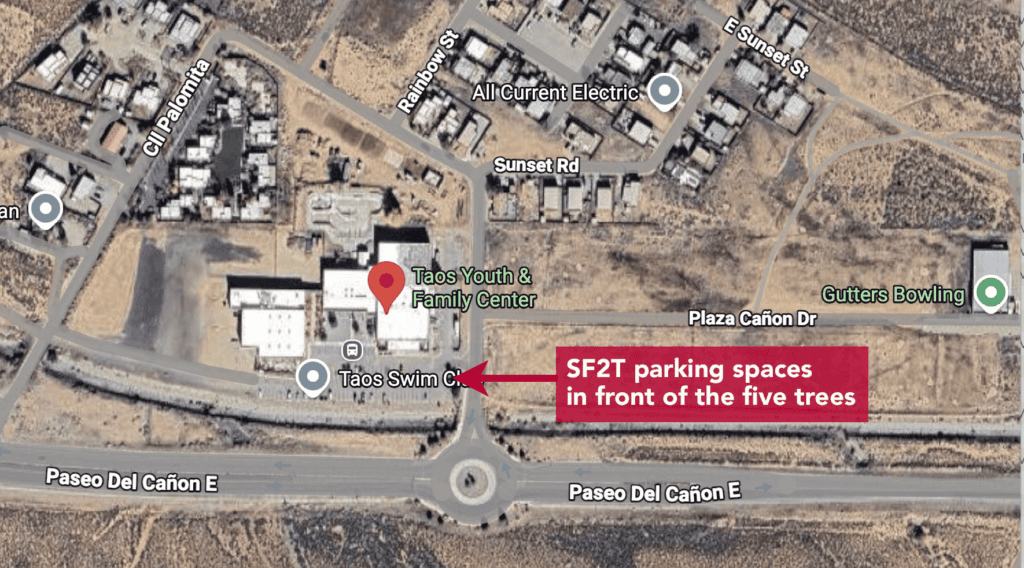 Scenic view of Taos Youth & Family Center near Paseo Del Cañón E, highlighting SF2T parking spots.