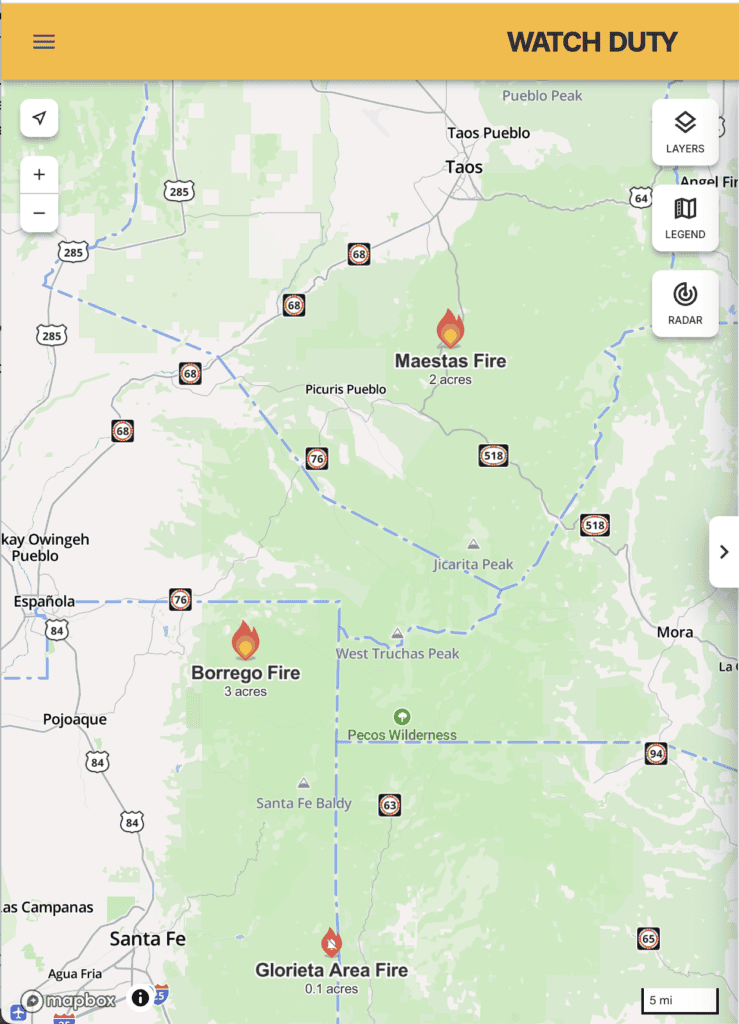Map showing fire locations and trail conditions near Santa Fe and Taos, NM.