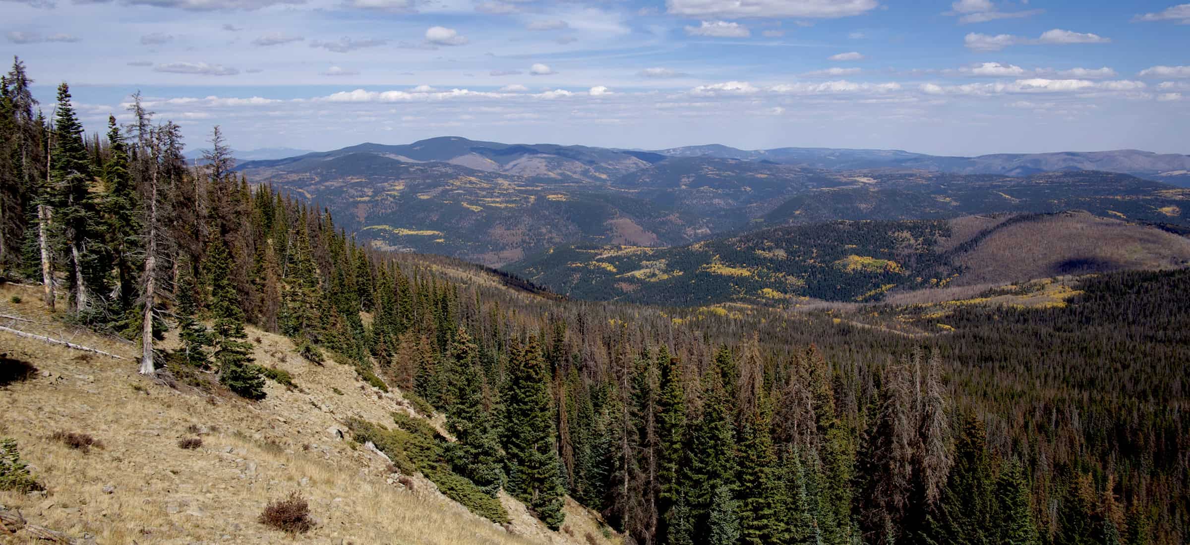 Scenic view of mountain landscape along the Santa Fe to Taos Thru-Hike trail.